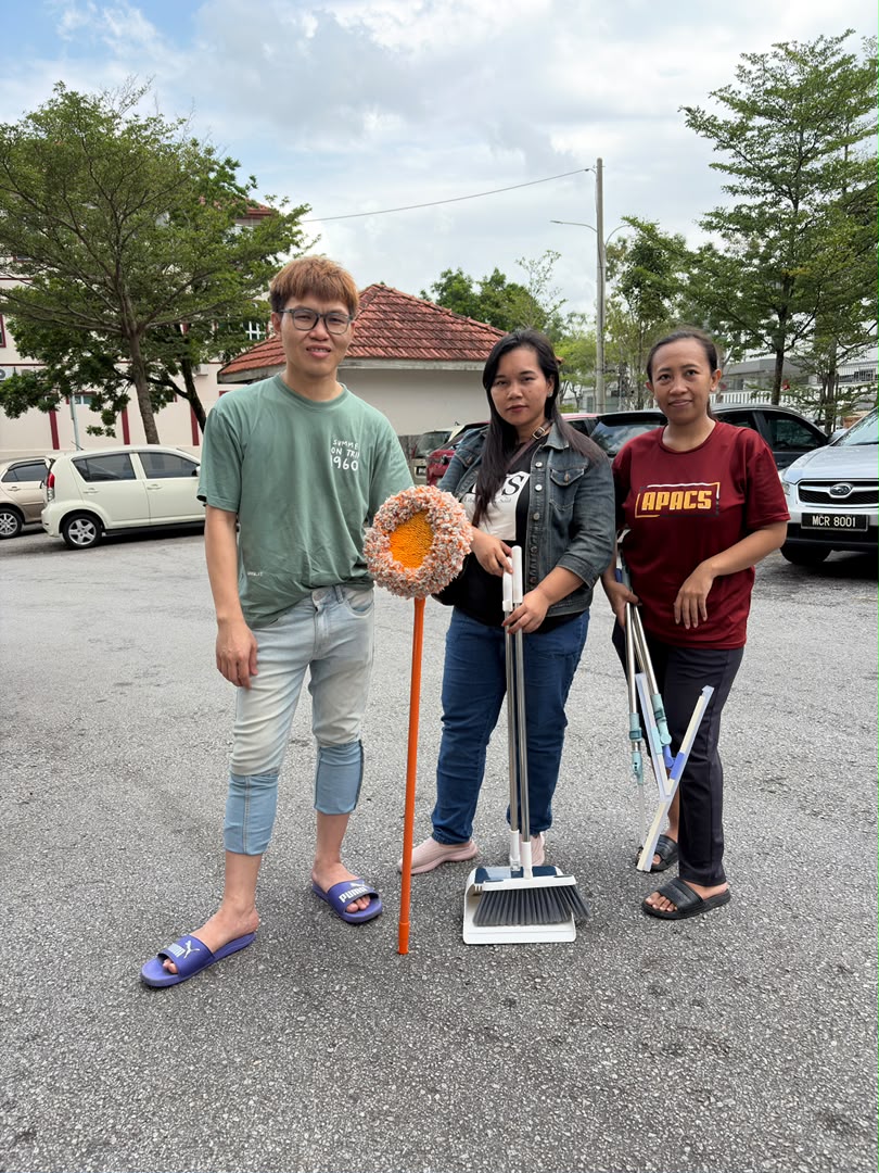 ServiceKru crew posing with cleaning equipment before a job